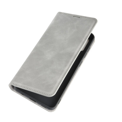 For Galaxy A21s Retro-skin Business Magnetic Suction Leather Case with Holder & Card Slots & Wallet